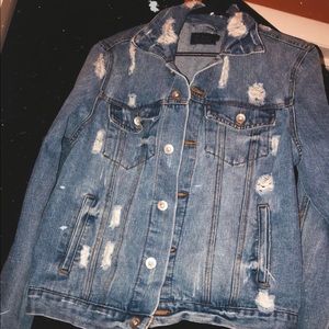 Distressed denim jacket